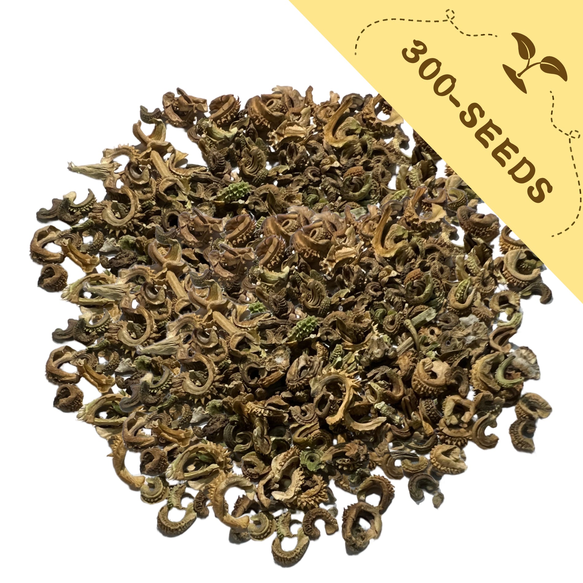 Heap of dried green herbs with a yellow label indicating '300-seeds' on a white background.English Marigold Scotch Marigold Calendula Seeds